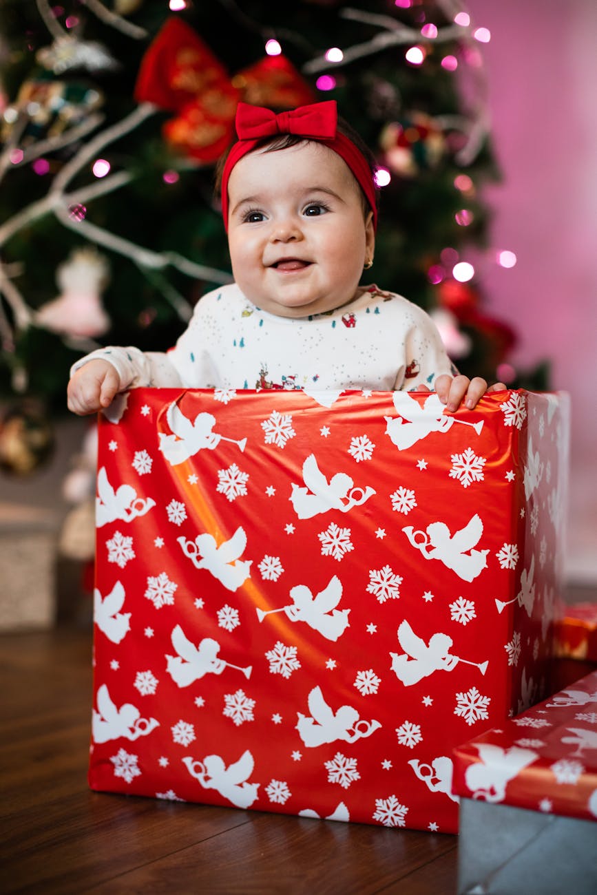 happy child with christmas presents at home