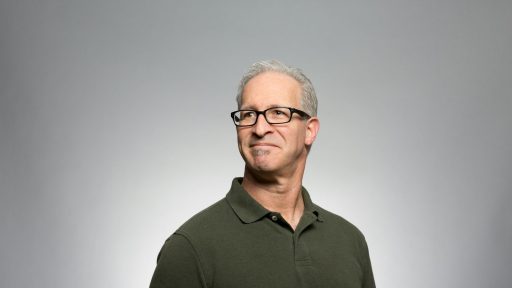 man wearing green polo shirt