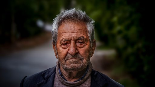a man with a serious look on his face