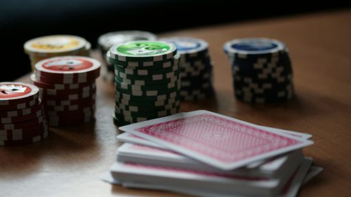 red and white checkered ceramic mug on white table