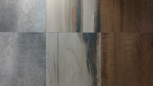 a tile floor with a tile wall