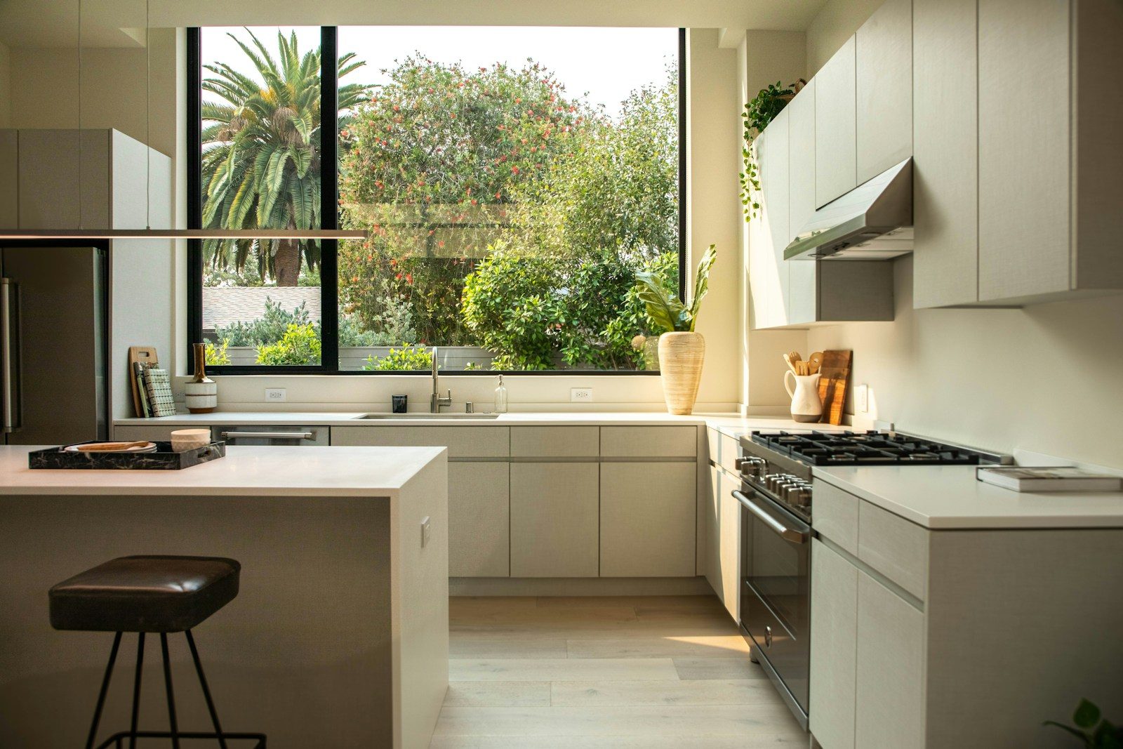modern kitchen with island and large window