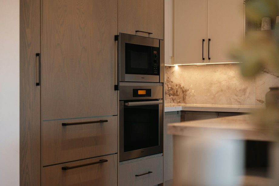 Modern kitchen with built-in oven and microwave